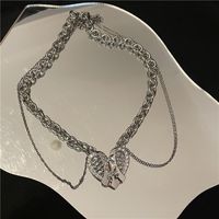 Wholesale Hollow Heart Titanium Steel Double Tassel Necklace Nihaojewelry main image 5