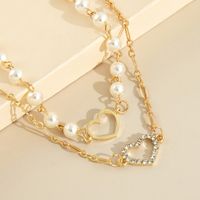 Wholesale Jewelry Hollow Heart Pendant Double-layer Pearl Necklace Nihaojewelry main image 4