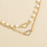 Wholesale Jewelry Hollow Heart Pendant Double-layer Pearl Necklace Nihaojewelry main image 6
