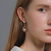 Wholesale Jewelry Hollow Leaf Pearl Pendant Earrings Nihaojewelry main image 1