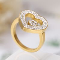 18k Corée Simple En Acier Inoxydable Creux Coeur Incrusté Zircon Anneau En Gros Nihaojewelry main image 3