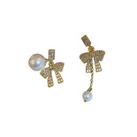 Fashion Asymmetrical Pearl Inlaid Rhinestone Bow Earrings Wholesale Nihaojewelry main image 6