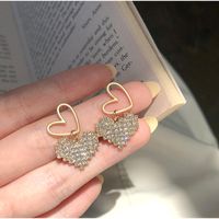 Boucles D&#39;oreilles Creuses Double Coeur Coréen En Gros Nihaojewelry main image 1