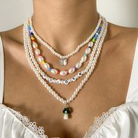 Vintage Kontrastfarbe Mehrschichtige Buchstaben Perlenkette Pilz Schmetterling Halskette Großhandel Nihaojewelry main image 1