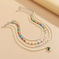 Vintage Contrast Color Multi-layer Letter Pearl Chain Mushroom Butterfly Necklace Wholesale Nihaojewelry main image 3
