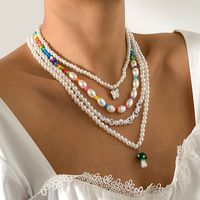 Vintage Kontrastfarbe Mehrschichtige Buchstaben Perlenkette Pilz Schmetterling Halskette Großhandel Nihaojewelry main image 4