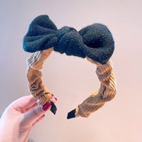 South Korea's Dongdaemun Autumn And Winter New Knitted Bowknot Contrasting Color Headband Western Simple Temperament Pressure Hair Sweet Headband sku image 4