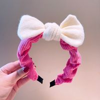 South Korea's Dongdaemun Autumn And Winter New Knitted Bowknot Contrasting Color Headband Western Simple Temperament Pressure Hair Sweet Headband sku image 1