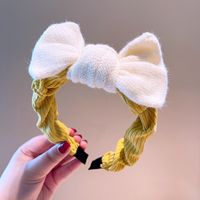 South Korea's Dongdaemun Autumn And Winter New Knitted Bowknot Contrasting Color Headband Western Simple Temperament Pressure Hair Sweet Headband sku image 5