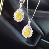 The New Luxury Water Drop Pear-shaped Yellow Diamond Pendant Is Micro-studded With Diamond Pink Crystal Stud Earrings Open Ring Caibao Necklace Set main image 3