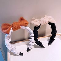 South Korea's Dongdaemun Autumn And Winter New Knitted Bowknot Contrasting Color Headband Western Simple Temperament Pressure Hair Sweet Headband main image 6