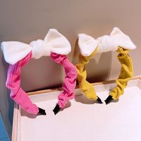 South Korea's Dongdaemun Autumn And Winter New Knitted Bowknot Contrasting Color Headband Western Simple Temperament Pressure Hair Sweet Headband main image 5