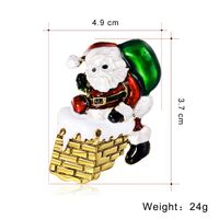 New Christmas Brooch Jewelry Alloy Dripping Cartoon Holiday Santa Corsage Wholesale main image 3