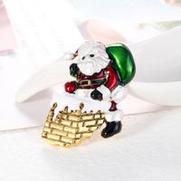 New Christmas Brooch Jewelry Alloy Dripping Cartoon Holiday Santa Corsage Wholesale main image 4