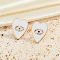 Bijoux Européens Et Américains Personnalité Pêche En Forme De Coeur Yeux Diamant Boucles D'oreilles Boucles D'oreilles Créatives main image 4