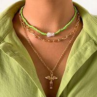 Cross-border Jewelry Retro Cross Jesus Portrait Tag Necklace Imitation Pearl Simple Rice Bead Woven Necklace main image 1