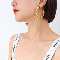Niche Light Luxury Design Button Pattern Hollow Earrings Titanium Steel Plated 18k Real Gold Earrings Jewelry sku image 1