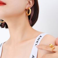 Niche Light Luxury Design Button Pattern Hollow Earrings Titanium Steel Plated 18k Real Gold Earrings Jewelry sku image 4