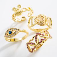 Mode Kreative Persönlichkeit Kupfer Vergoldet Intarsien Zirkon Auge Liebesring Öffnung Verstellbarer Ring Zubehör main image 1