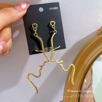 Ins Style Minimalist Fun Face Earrings Hollow Abstract Earrings Korean Personality Design Exaggerated Long Earrings main image 5
