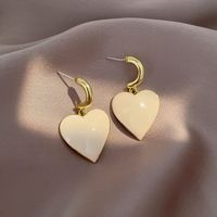 Korea S925 Silver Needle Milky White Love Earrings Temperament Fashion Atmospheric Earrings Simple Wild Earrings sku image 1