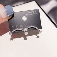 Korean Imitation Pearl Curved Zircon Micro-inlaid Earrings Wholesale Nihaojewelry sku image 1