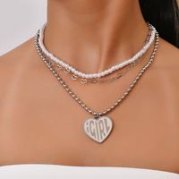 الأزياء القلب إلكتروني قلادة اللؤلؤ متعدد الطبقات الفولاذ المقاوم للصدأ قلادة الجملة Nihaojewelry main image 1