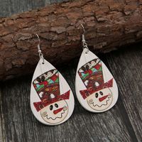 Independent Station New Christmas Water Drop Cartoon Snow Leather Earrings Cute Smiley Face Pu Earrings Wholesale main image 1