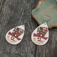 Independent Station New Christmas Water Drop Cartoon Snow Leather Earrings Cute Smiley Face Pu Earrings Wholesale sku image 1