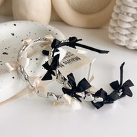 Korean Three-dimensional Metal Heart Bow Ribbon Simple Thin Hairband Wholesale main image 1