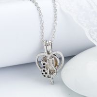 Collar De Diamantes De Imitación Con Colgante De Jaula Hueca De Corazón De Perla Frígida Simple sku image 1