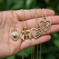 Fashion Hollow Heart Simple Micro-inlaid Zircon Love Pendant Copper Necklace main image 1