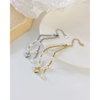 Nouveau Bracelet En Acier Inoxydable Avec Perles D&#39;eau Douce Et Coutures De Coeurs De Pêche Rétro En Gros main image 4