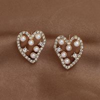 Boucles D&#39;oreilles En Alliage De Perles En Strass En Forme De Coeur De Mode En Gros main image 1