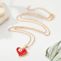 Fashion Alloy Drip Oil Color Eyes Wings Heart Necklace Peach Heart Devil Eye Necklace main image 3