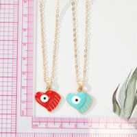 Fashion Alloy Drip Oil Color Eyes Wings Heart Necklace Peach Heart Devil Eye Necklace main image 4