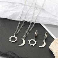 Korea Simple Alloy Hollow Sun Moon Asymmetric Earrings Necklace Wholesale main image 1