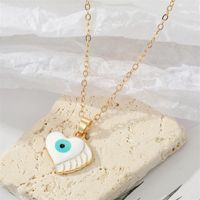 Fashion Alloy Drip Oil Color Eyes Wings Heart Necklace Peach Heart Devil Eye Necklace sku image 1