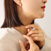 Korean New Imitation Pearl Tassel Titanium Steel Earrings sku image 1