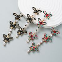 Fashion Rhinestone Butterfly Long Pearl Alloy Earrings Wholesale main image 1