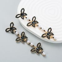 Mode Strass Papillon Longue Perle Alliage Boucles D&#39;oreilles En Gros main image 3
