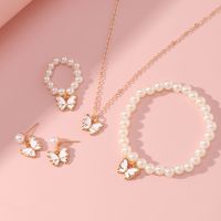 New Butterfly Pendant Pearl Bracelet Children's Ring Earrings Jewelry Set Wholesale main image 1