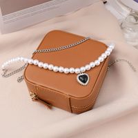 Creative Simple Multi-layer Black Heart Double-layer Pearl Chain Alloy Necklace main image 3