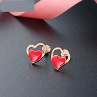 Fashion S925 Silver Fashion Hollow Heart-shaped Inlaid Zircon Earrings sku image 1