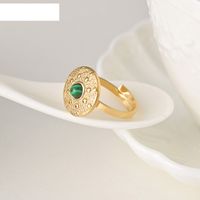 Nischenlicht-luxus-ring Mit Rundem Gesicht Und Eingelegtem Türkisfarbenem Titanstahl sku image 1
