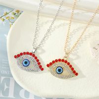 Retro Full Rhinestone Hollow Eye Red Eyelashes Contrast Color Pendant Necklace main image 1