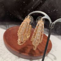 Fashion Oval Zircon Multi-layer Three-dimensional Copper Hoop Earrings Wholesale main image 3
