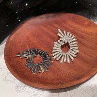 Fashion Geometric Fireworks Flower Oval Inlaid Zircon Copper Earrings main image 4