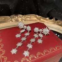 Fashion Eight-pointed Star Long Tassel Inlaid Zircon Copper Snowflake Earrings sku image 1