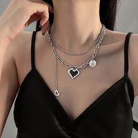 Korean Retro Heart Dyed Black Stacked Thollow Design English Collarbone Chain Female main image 1